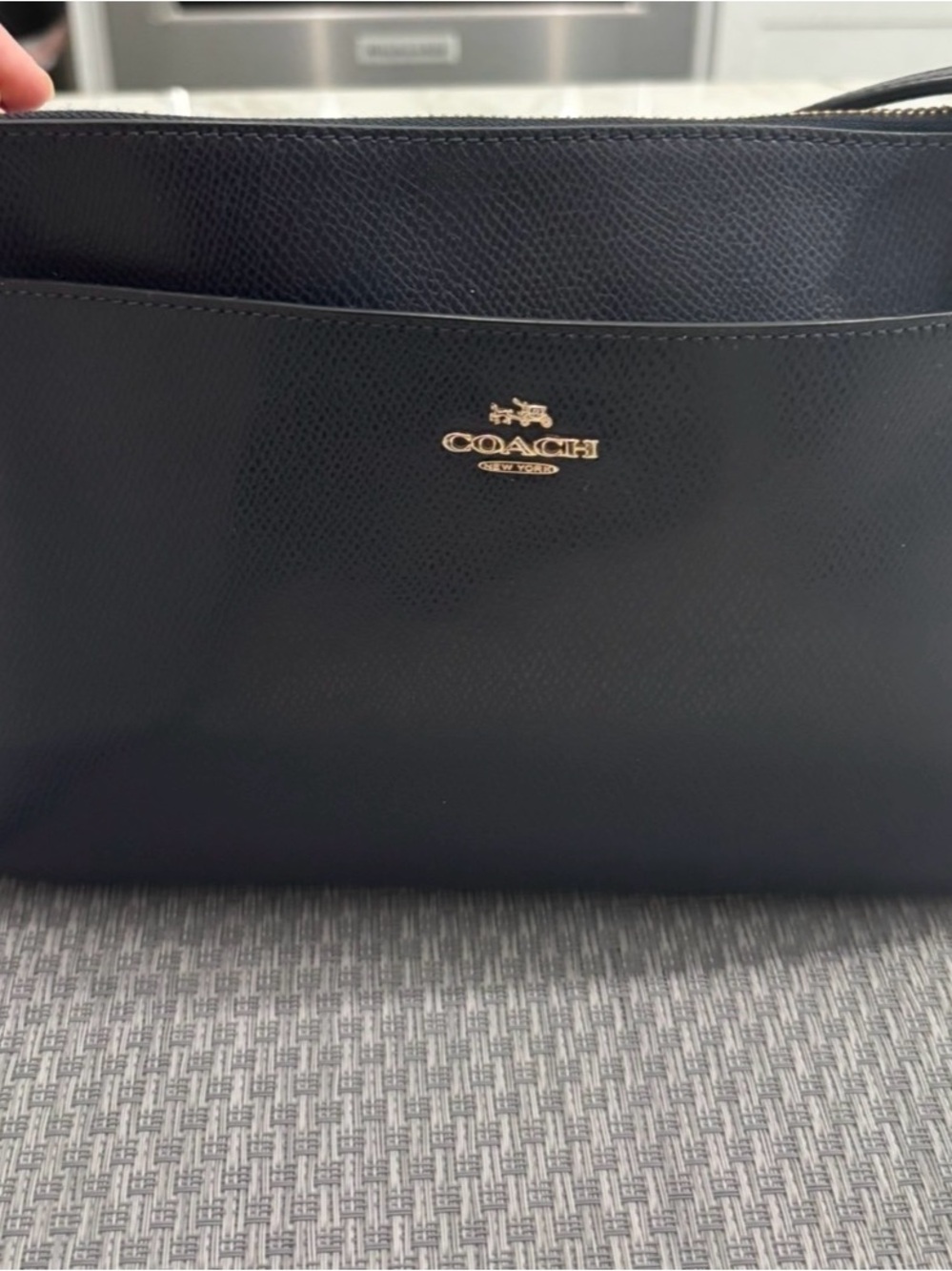 Coach Black Leather Crossbody Bag with Gold Logo Accent